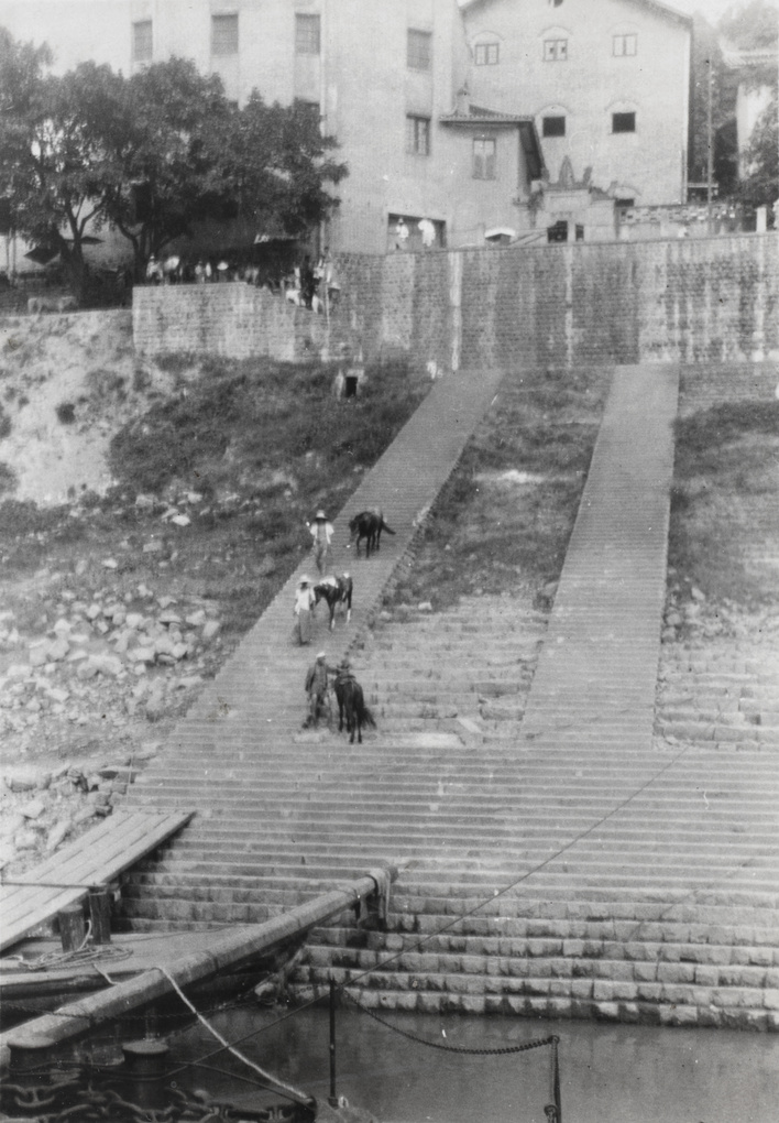 Hiring ponies coming down the steps, Chongqing