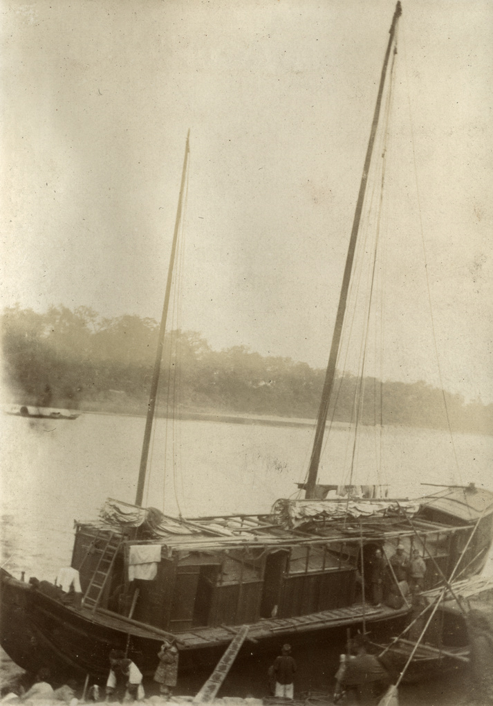 Moored boat with sails