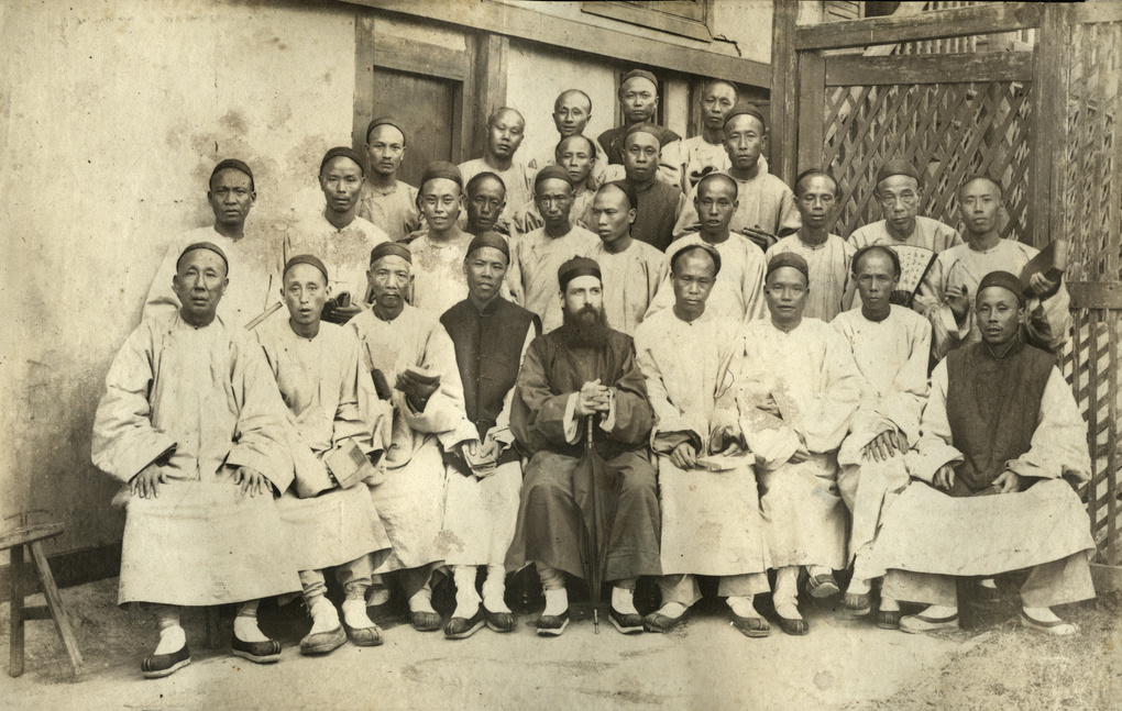 Bishop Banister with a group of Chinese men