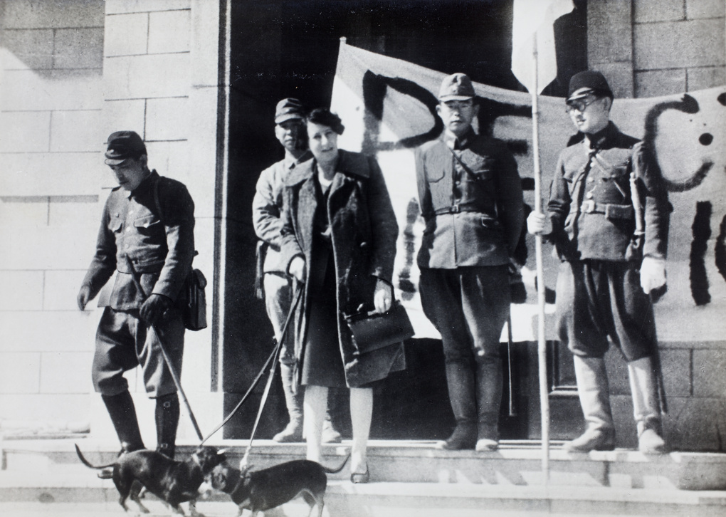 British hostage Mavis Lee and her dachshunds, with Japanese envoys, Hong Kong