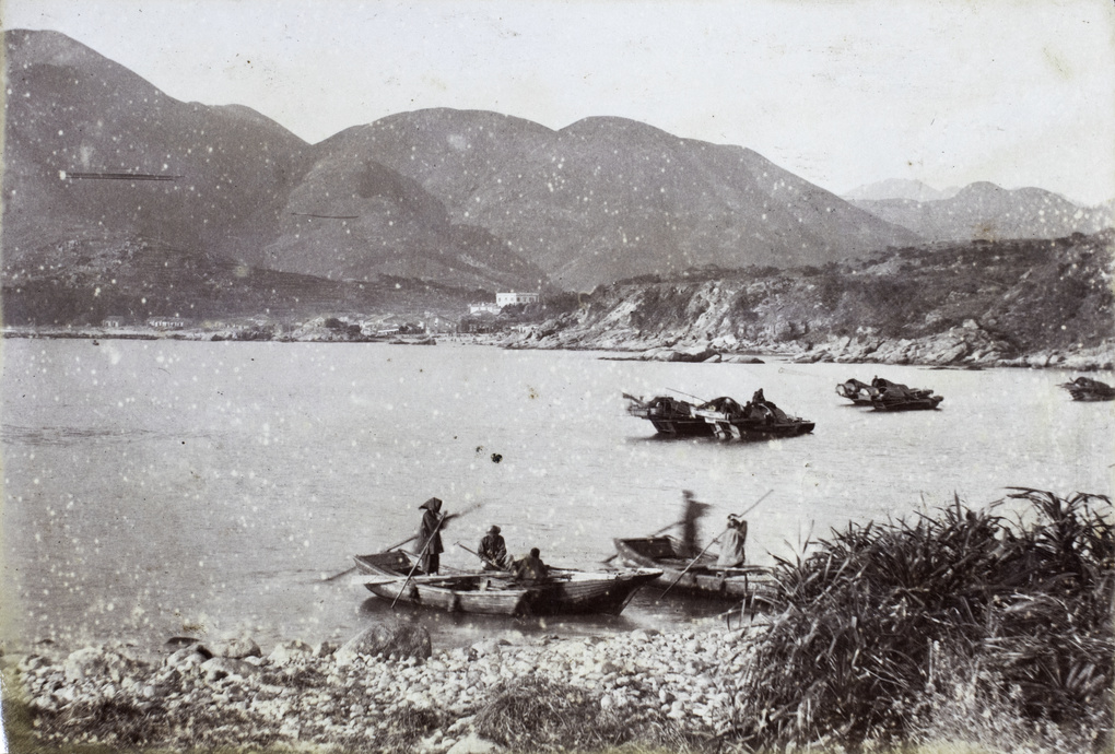 Sampans and coastal view, possibly Shek O Rocky Bay, Hong Kong