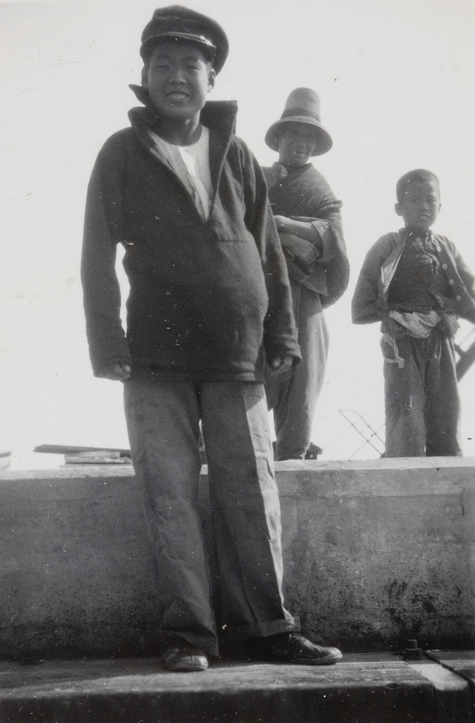 A boy with a sailor cap, with an older man and another boy, Qinhuangdao (秦皇島)