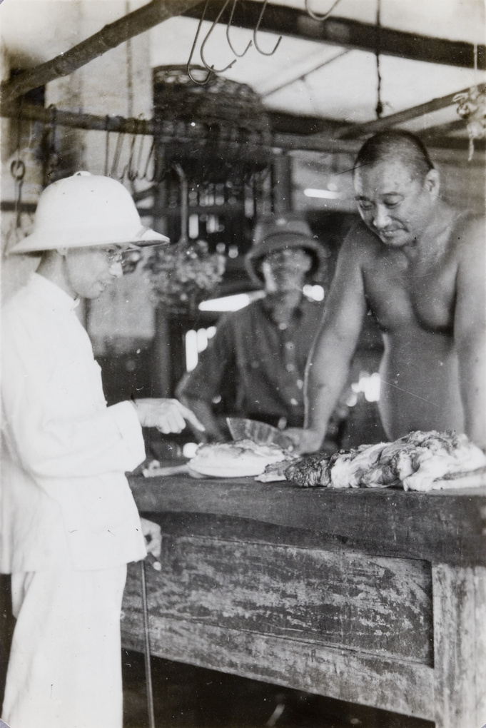 A customer and a butcher, Hong Kong