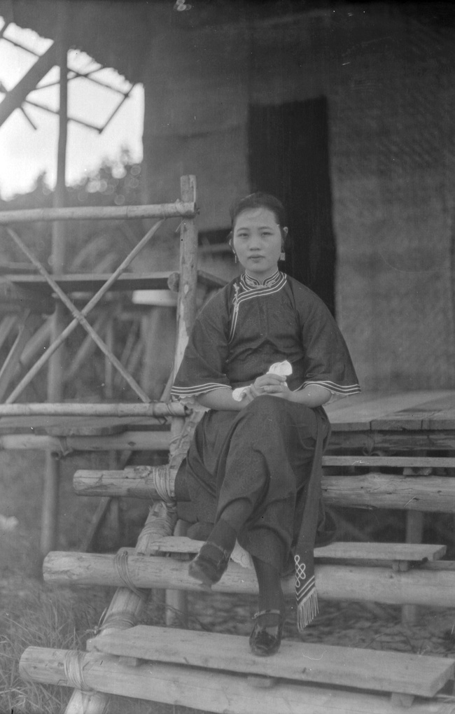 A woman sitting on steps