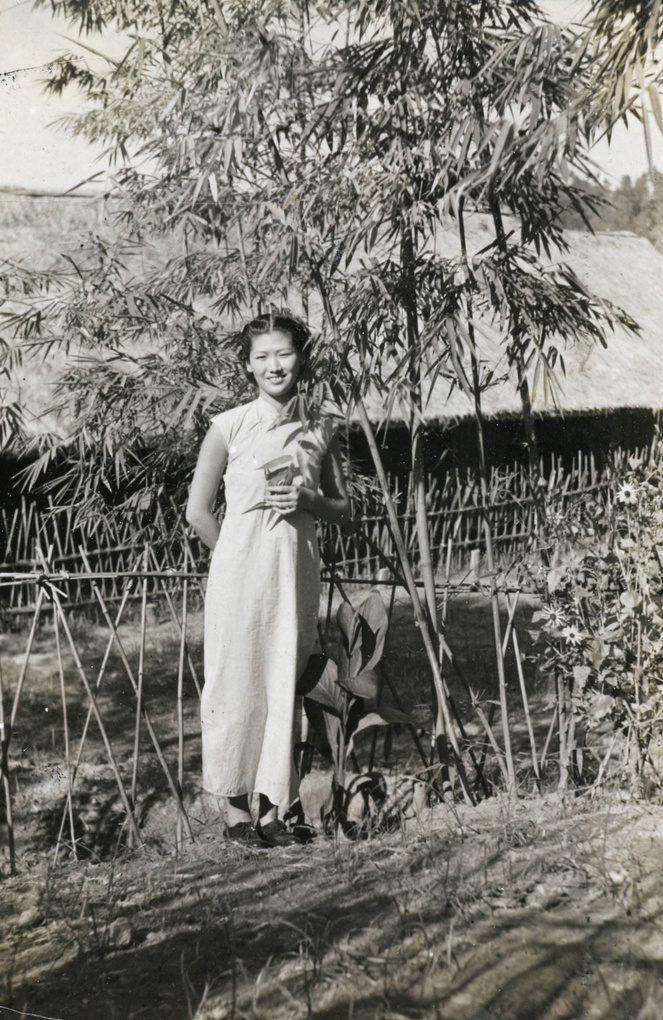 Jiang Fangling in a garden