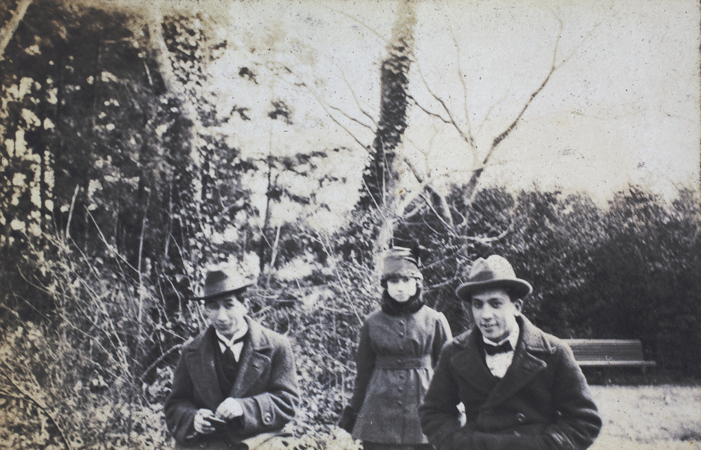 Tom Hutchinson and John Piry with a young woman in Jessfield Park, Shanghai