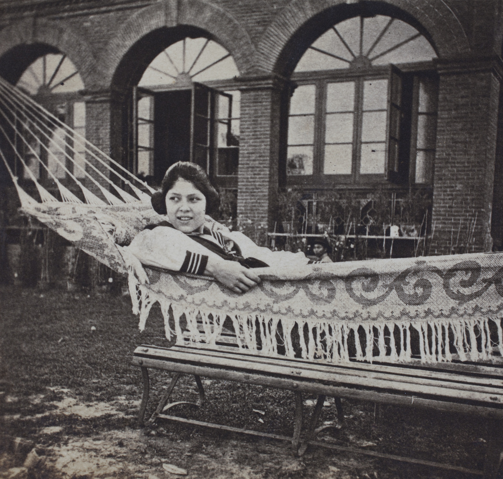 Mabel Parker in a hammock in the garden, 35 Tongshan Road, Hongkou, Shanghai