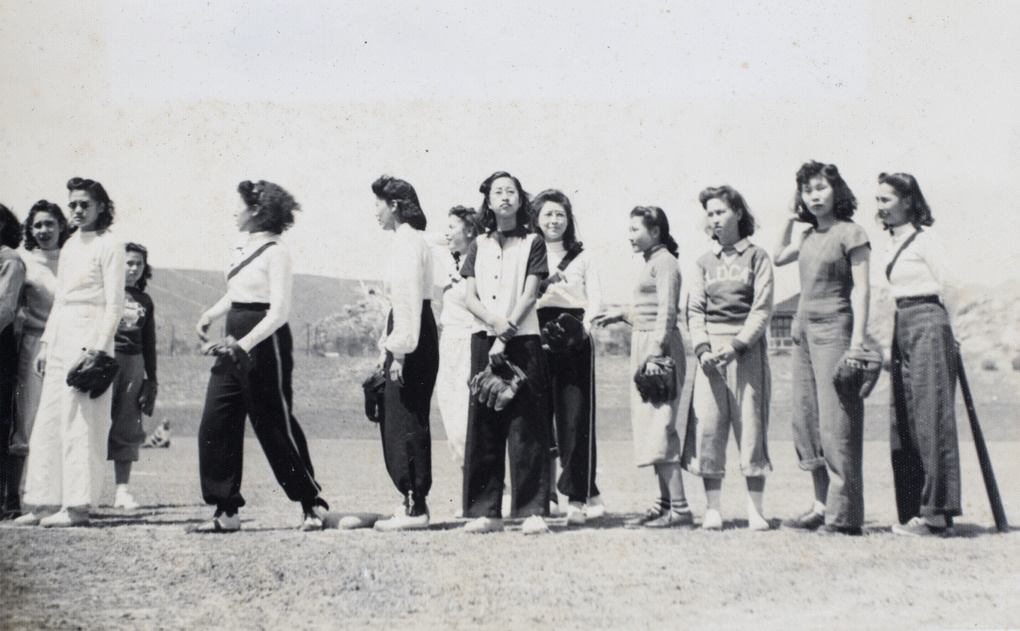 Gladys Hutchinson in a group of softball players, Kowloon, Hong Kong