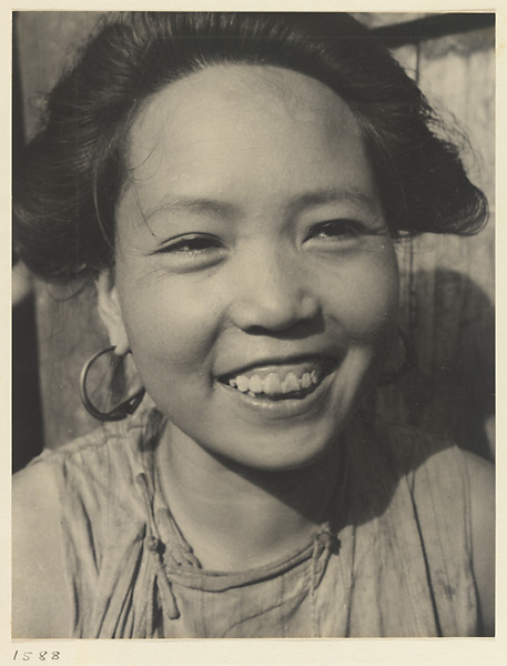 Woman from the ""Lost Tribe"" country wearing earrings