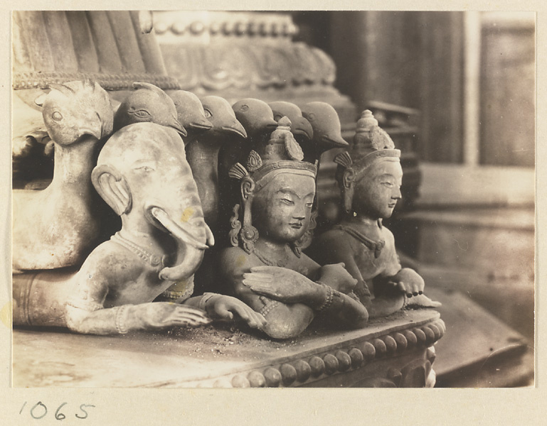 Details of statues of Ganesha, two Bodhisattvas, and birds