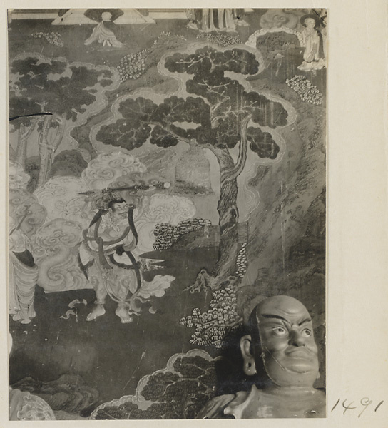 Mural detail and head of a Luohan at Qian men temple or Guan di miao