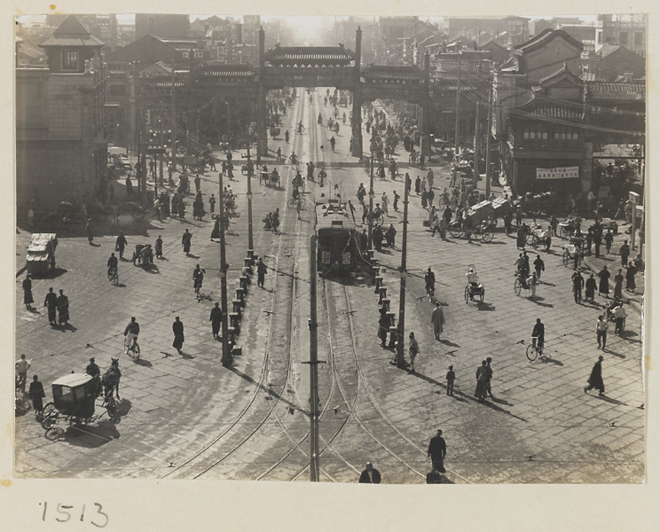 Pai lou and street seen from Qian men