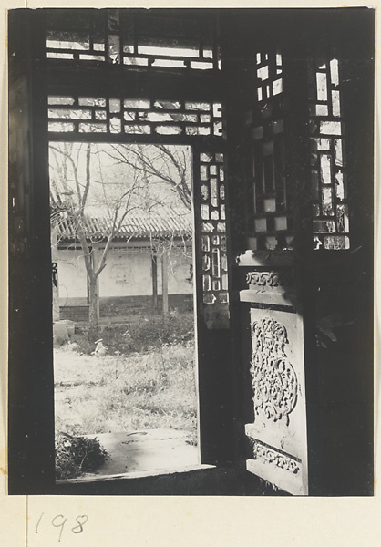 Doorway with latticework leading to the Old Wu Garden