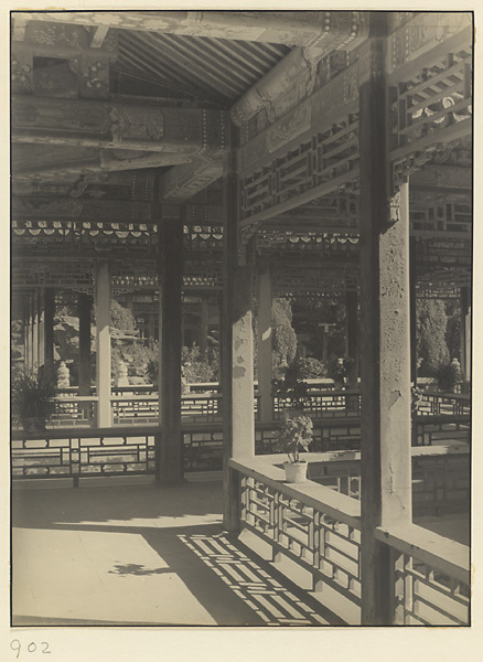 Interior view of covered walkways at Nanhai Gong Yuan showing painted rafters