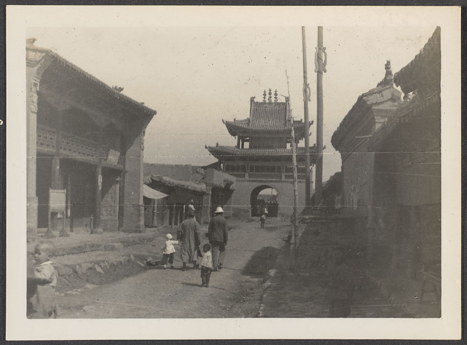 Payenjung.  Its beginnings were in a military camp to quell the Tibetans.  The Drum Tower & main street.