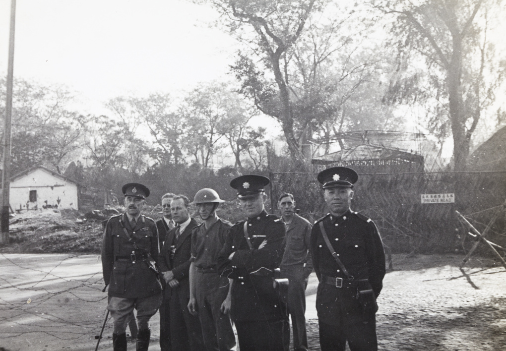 Major-General Alexander Tefler-Smollett with British officials