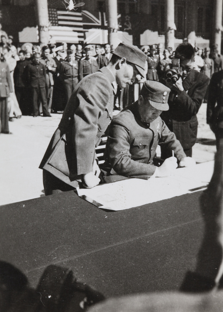 General Sun Lianzhong signing Japanese surrender documents, 10 October 1945