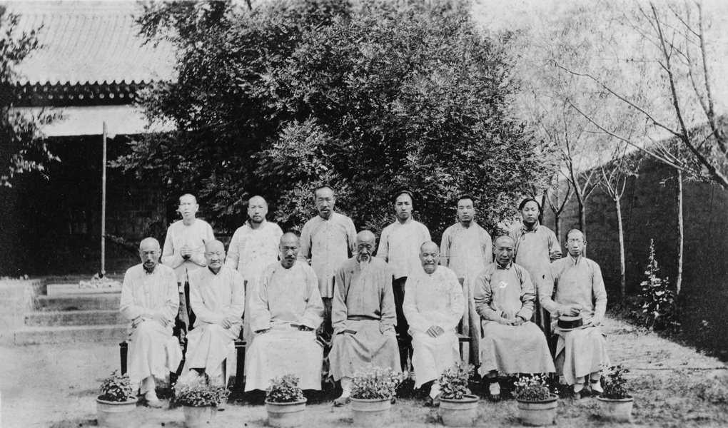 Group portrait of thirteen Chinese men