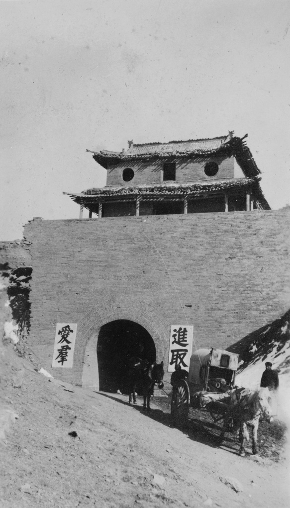 A gate at Yanmen Pass, Great Wall of China, Xinzhou, with a Peking cart