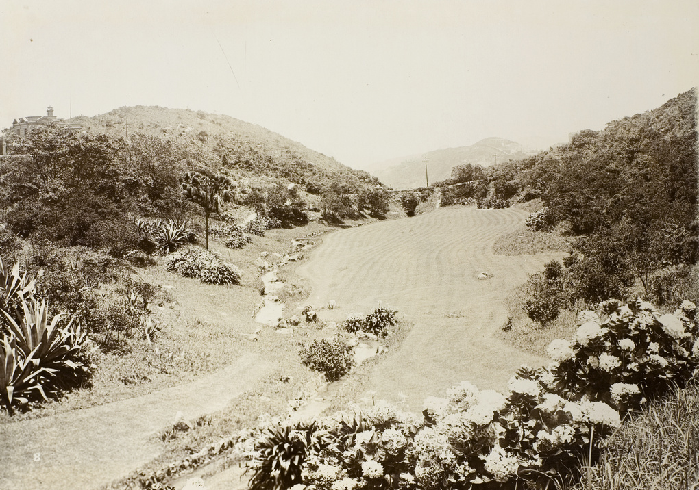 The garden lawn, possibly on the grounds of Mountain Lodge, Hong Kong