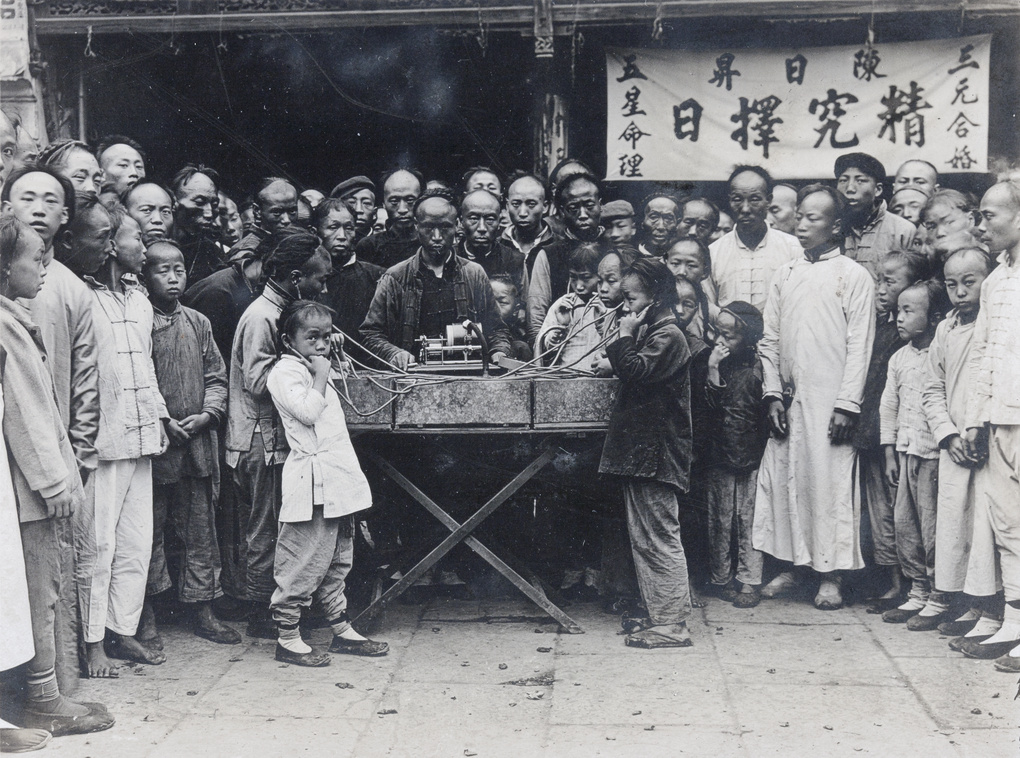 A street show demonstration of a phonograph, Temple of the City Gods, Shanghai