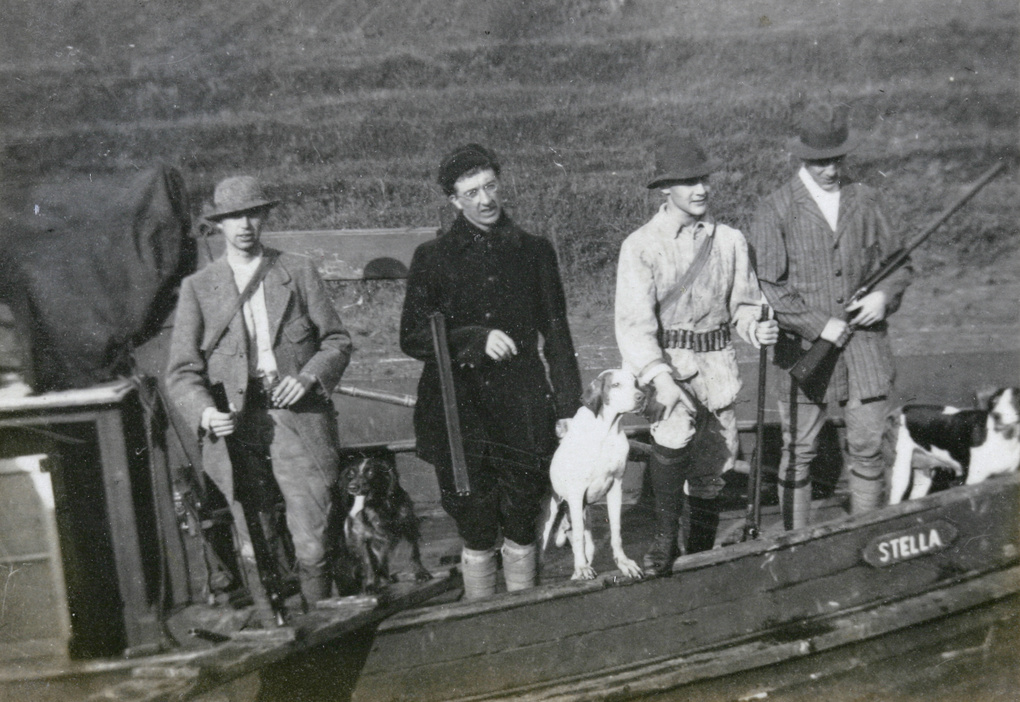 Duck hunters, with their dogs, on the 'Stella'
