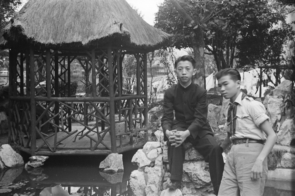 Boy Scout and another boy, in a hospital garden, Shanghai