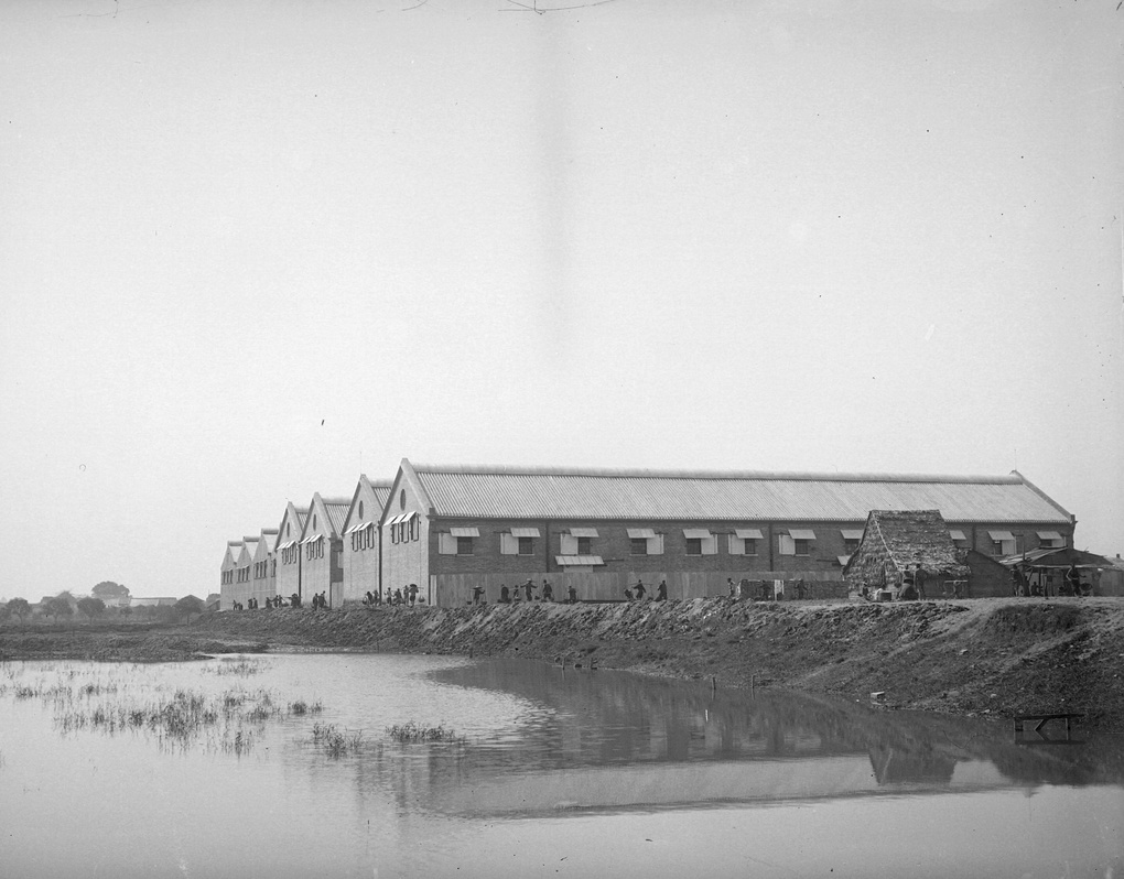 A warehouse beside a river, Canton, 1907