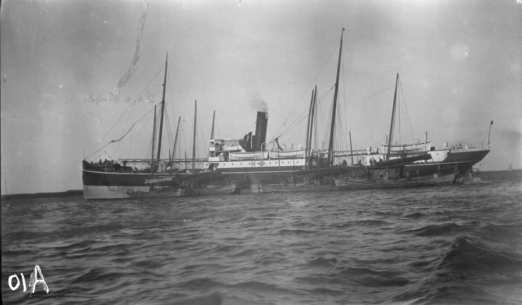 The steamer 'Foochow II' with junks