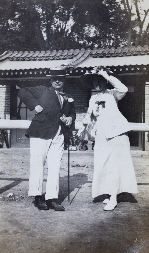 William Boyd Cooper with a woman, at the Peking races (Pao Ma Chang)