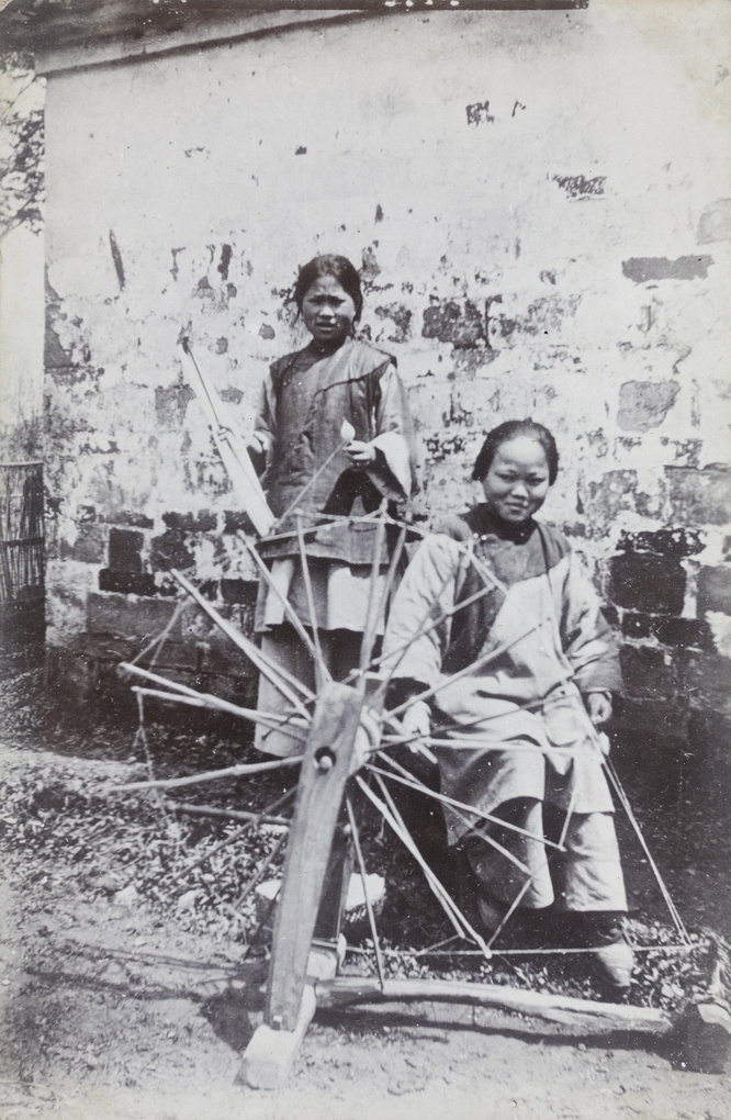 Women spinning, with a spinning wheel