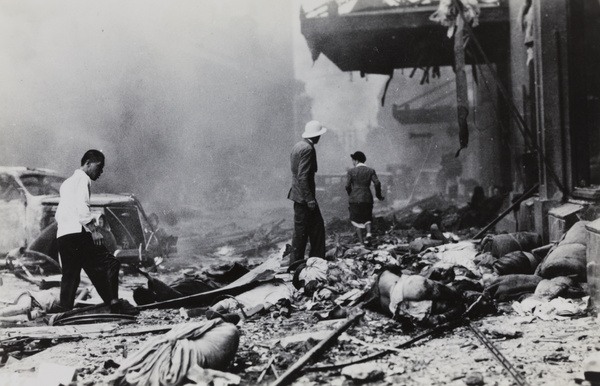 Casualties and debris outside the Cathay Hotel, Shanghai, after the bombing on 14 August 1937