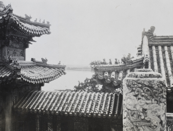 Details of pavilion roof, with Shiqikong Bridge (十七孔橋) in the background, Summer Palace, Beijing