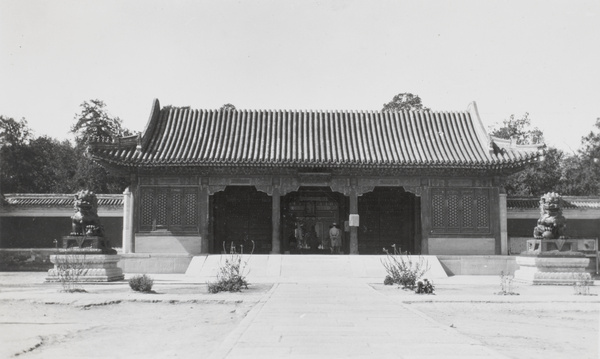 Visitors in a building in the Forbidden City, Beijing