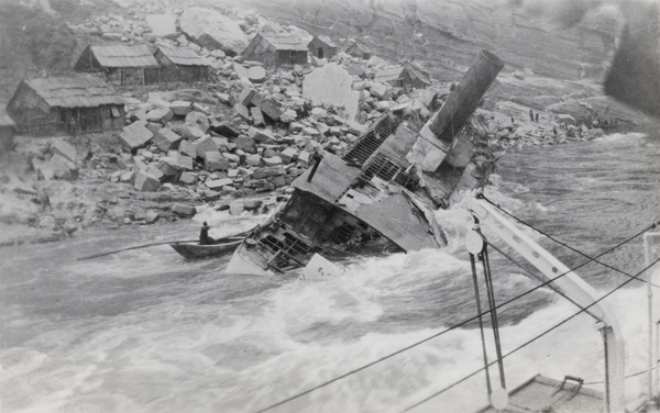  Wreck of a steamer and some huts in the background, Yangtze Gorges