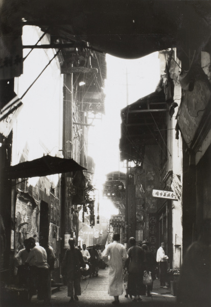 Narrow street lined with shops, Yichang
