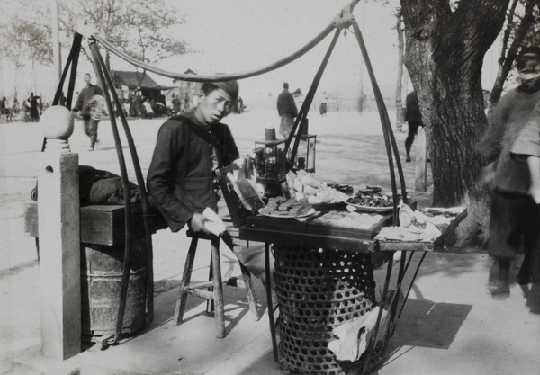  A sweet seller with his travelling shop