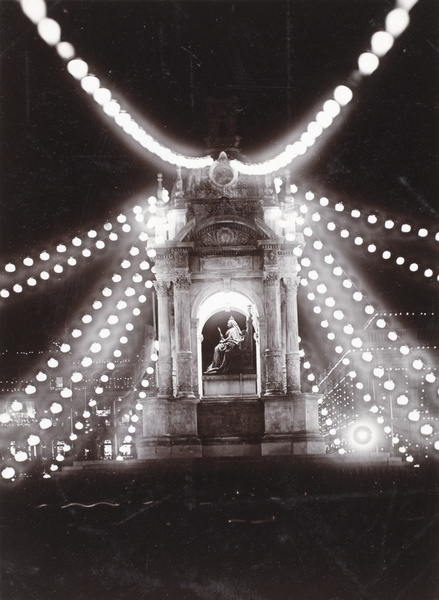 Queen Victoria's statue, Hong Kong, lit up with lanterns for the coronation of King George V and Queen Mary