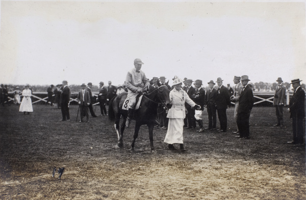 Woman leading a racehorse, Hankow Race Club (汉口赛马会)