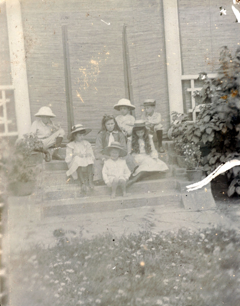 Children by screened veranda, 1901