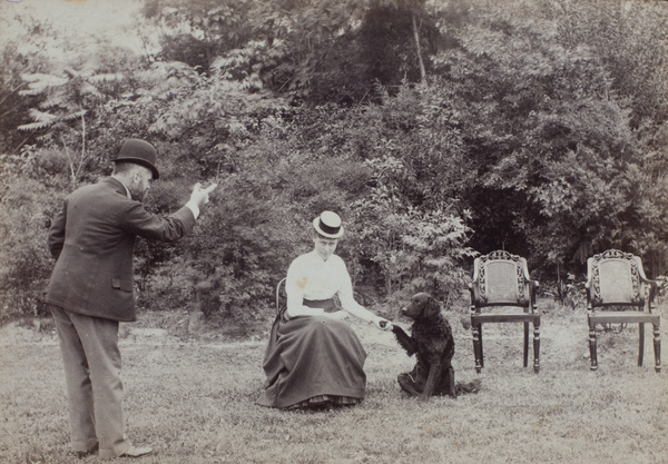 David and Edith Henderson, posing with a dog