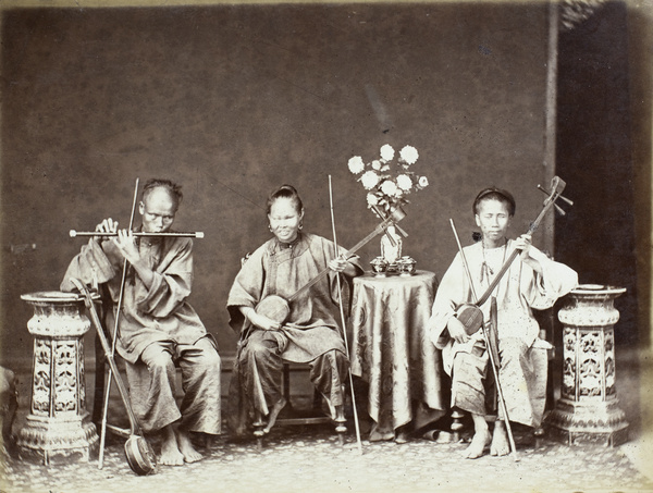 Studio photograph of three Chinese musicians with Chinese flute and Erhu (二胡), Hong Kong