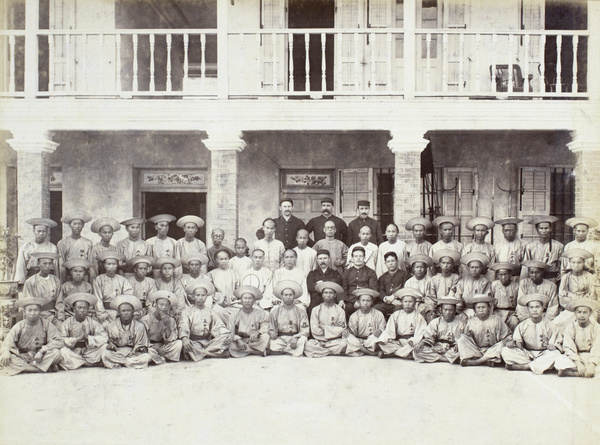 Chinese boatmen and clerks, and European staff