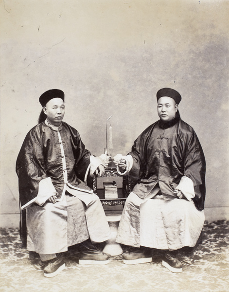 Studio photograph of two Chinese officials