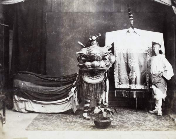 Studio photograph of lion dancers in costume