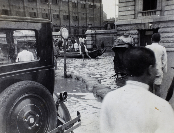 Motorcar, boat, sandbags and rickshaw, during the 1931 floods, Hankou, Wuhan