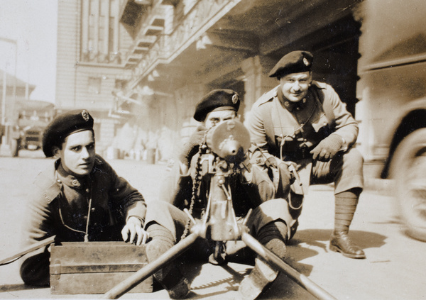 Jack Ephgrave with other Shanghai Volunteer Corps men and machine gun, Shanghai, 1932