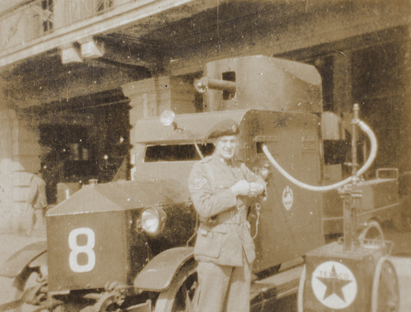 Eric Davies refuelling armoured car from a mobile Texaco fuel dispenser, Shanghai, 1932