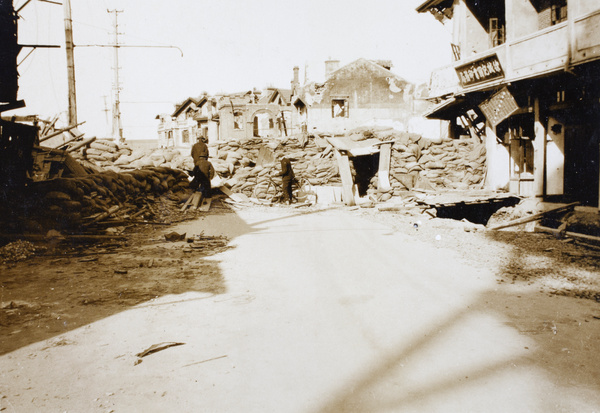 Sandbagged street barricade, Shanghai, 1932