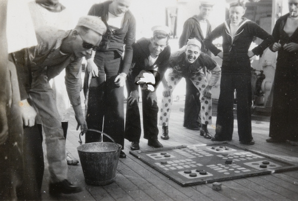 Sailors playing Ludo aboard H.M.S. Medway